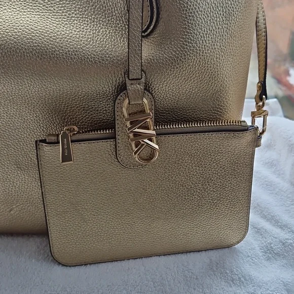 Michael Kors Shimmering  Gold Riversible Tote. - Picture 5 of 14